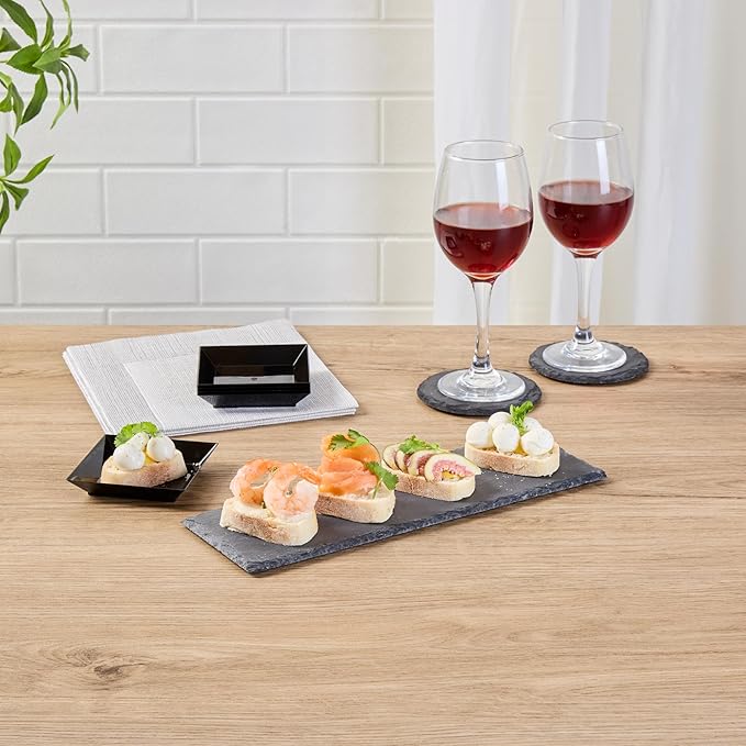 Restaurantware Slate Serving Trays 4 Pack of 11.8" x 4" Foam Feet Charcuterie Stone Plates Rustic Edges Freezable Black Serving Display Cheese Boards for Kitchen, Gourmet, Dining, Parties
