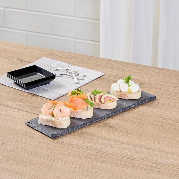 Restaurantware Slate Serving Trays 4 Pack of 11.8" x 4" Foam Feet Charcuterie Stone Plates Rustic Edges Freezable Black Serving Display Cheese Boards for Kitchen, Gourmet, Dining, Parties