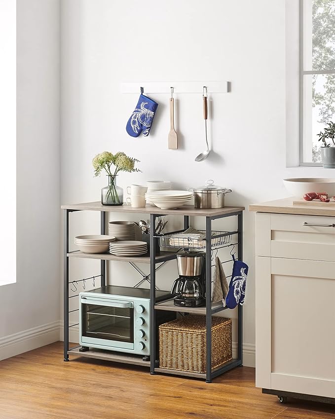 VASAGLE ALINRU Kitchen Baker’s Rack, Coffee Bar, Microwave Oven Stand, with Steel Frame, Wire Basket, 6 Hooks, for Mini Oven, Spices Utensils, Industrial, Greige and Black UKKS090B02