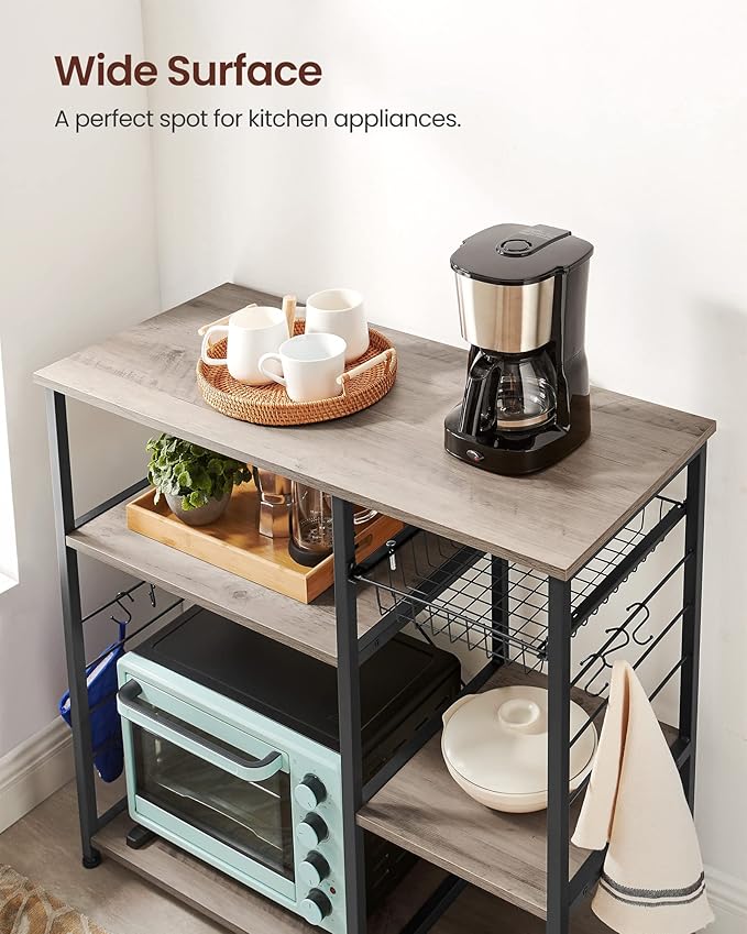 VASAGLE ALINRU Kitchen Baker’s Rack, Coffee Bar, Microwave Oven Stand, with Steel Frame, Wire Basket, 6 Hooks, for Mini Oven, Spices Utensils, Industrial, Greige and Black UKKS090B02