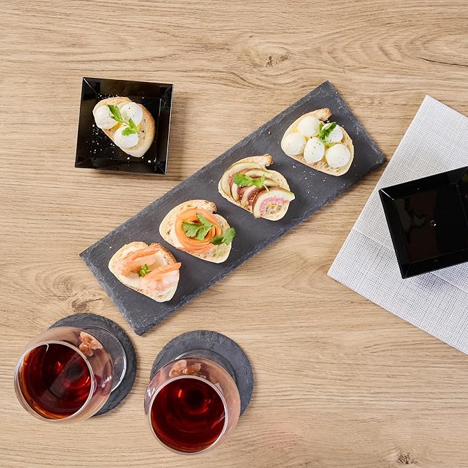 Restaurantware Slate Serving Trays 4 Pack of 11.8" x 4" Foam Feet Charcuterie Stone Plates Rustic Edges Freezable Black Serving Display Cheese Boards for Kitchen, Gourmet, Dining, Parties